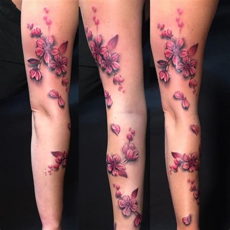 cherry blossom tattoo upper arm|cherry blossom tattoo on thigh.